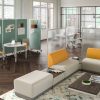 Flexible office furniture with collaborative lounge seating and movable acoustic panels in Vancouver
